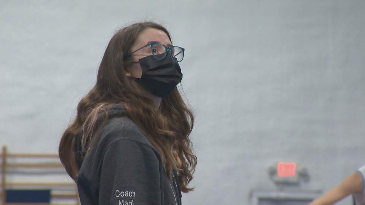 Gymnastics coach Madison Hebert looks on during a session at Tamarack Gymnastics in Mitchell, Man. 