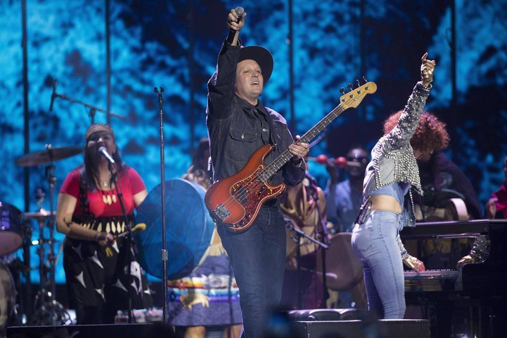 Arcade Fire performs at the Juno Awards in Vancouver, Sunday, March, 25, 2018. 