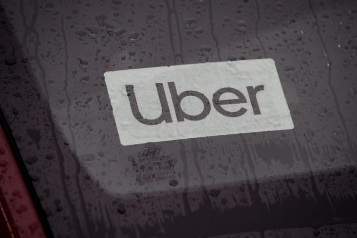 An Uber driver's vehicle is seen in Vancouver on Jan. 24, 2020. The United Food and Commercial Workers Union Canada, representing Toronto drivers for Uber Technologies Inc.’s premium Black service says it has reached a settlement in a case it was pursuing to help the workers unionize. 