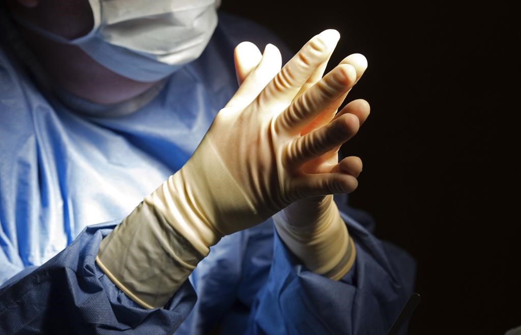 A doctor prepares for a surgical procedure at a hospital in this file photo.