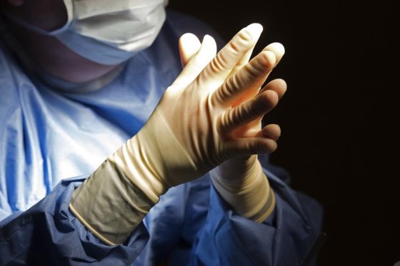 A doctor prepares for a surgical procedure at a hospital in this file photo.