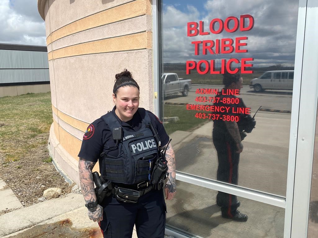 Const. Jennaye Norris of the Blood Tribe Police poses in Standoff, Alta., on Monday, May 9, 2022. Norris is the human trafficking coordinator at the police service. THE CANADIAN PRESS/Bill Graveland

.