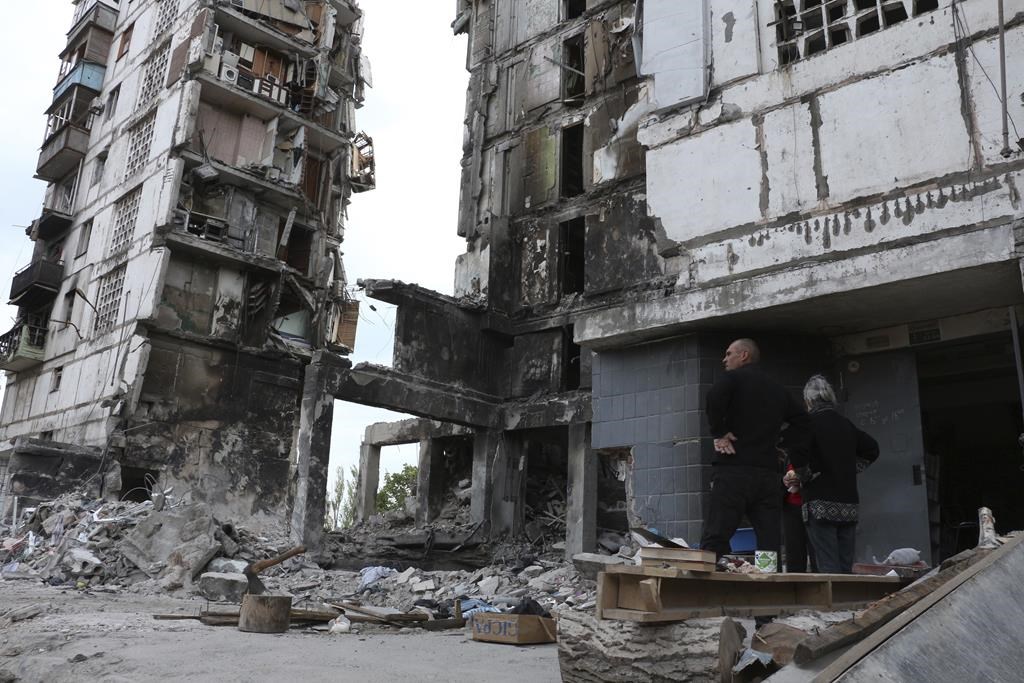 Russian troops pull back from Kharkiv after weeks of bombardment ...