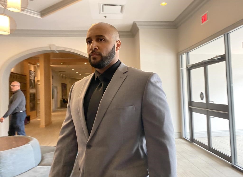 Const. Jeremy Son arrives at the coroner’s inquest into the death of Chantel Moore in Fredericton, Tuesday, May 17, 2022. An expert in Canadian policing says the New Brunswick police officer who fatally shot a 26-year-old Indigenous woman during a wellness check two years ago was following police training and practices. THE CANADIAN PRESS/Kevin Bissett