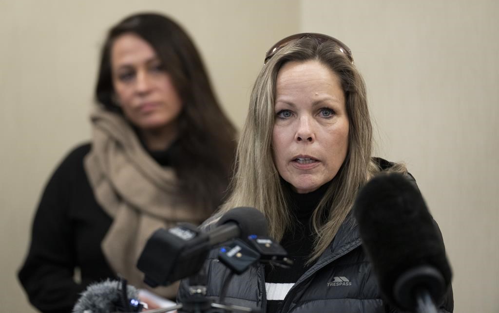 Tamara Lich, organizer for a protest convoy by truckers and supporters demanding an end to COVID-19 vaccine mandates, delivers a statement during a news conference in Ottawa, Thursday, Feb. 3, 2022. Lich has been accused of breaching her bail conditions and the Crown argues she should be placed back in jail until her trial. THE CANADIAN PRESS/Adrian Wyld.