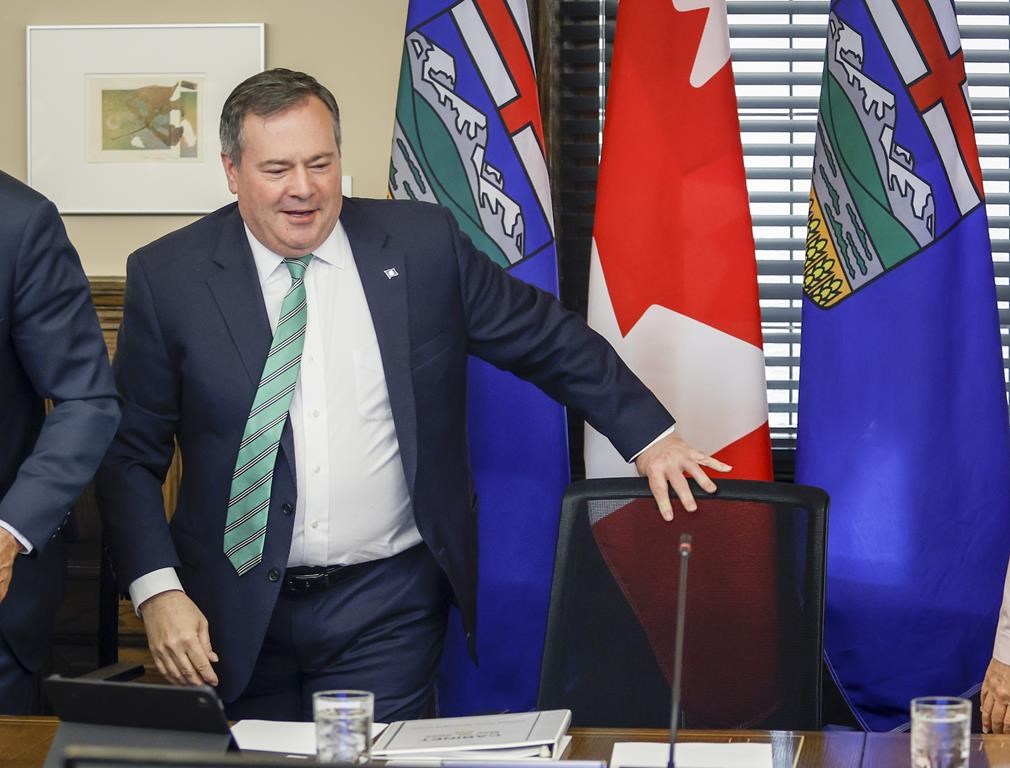Alberta Premier Jason Kenney says he will stay in the top job to maintain continuity and stability in government until a new United Conservative party leader is chosen, in Calgary, Alta., Friday, May 20, 2022.