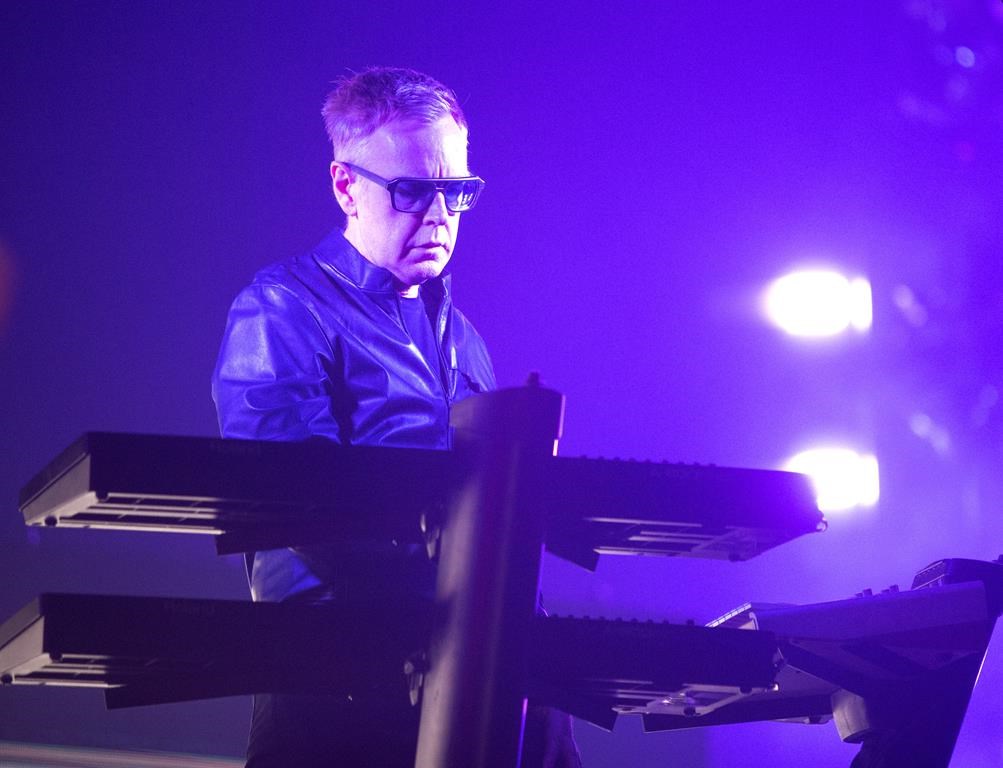 FILE - Andy Fletcher of the band Depeche Mode performs in concert during their "Global Spirit Tour" at the Capital One Arena, Sept. 7, 2017, in Washington, D.C. Fletcher, keyboardist for British synth pop giants Depeche Mode for more than 40 years has died at age 60. Depeche Mode announced the death of founding member Fletcher on its official social media pages. A person close to the band said Fletcher died Thursday, May 26, 2022, from natural causes at his home in the U.K. The person spoke on condition of anonymity because they were not authorized to speak publicly. (Photo by Owen Sweeney/Invision/AP, File).