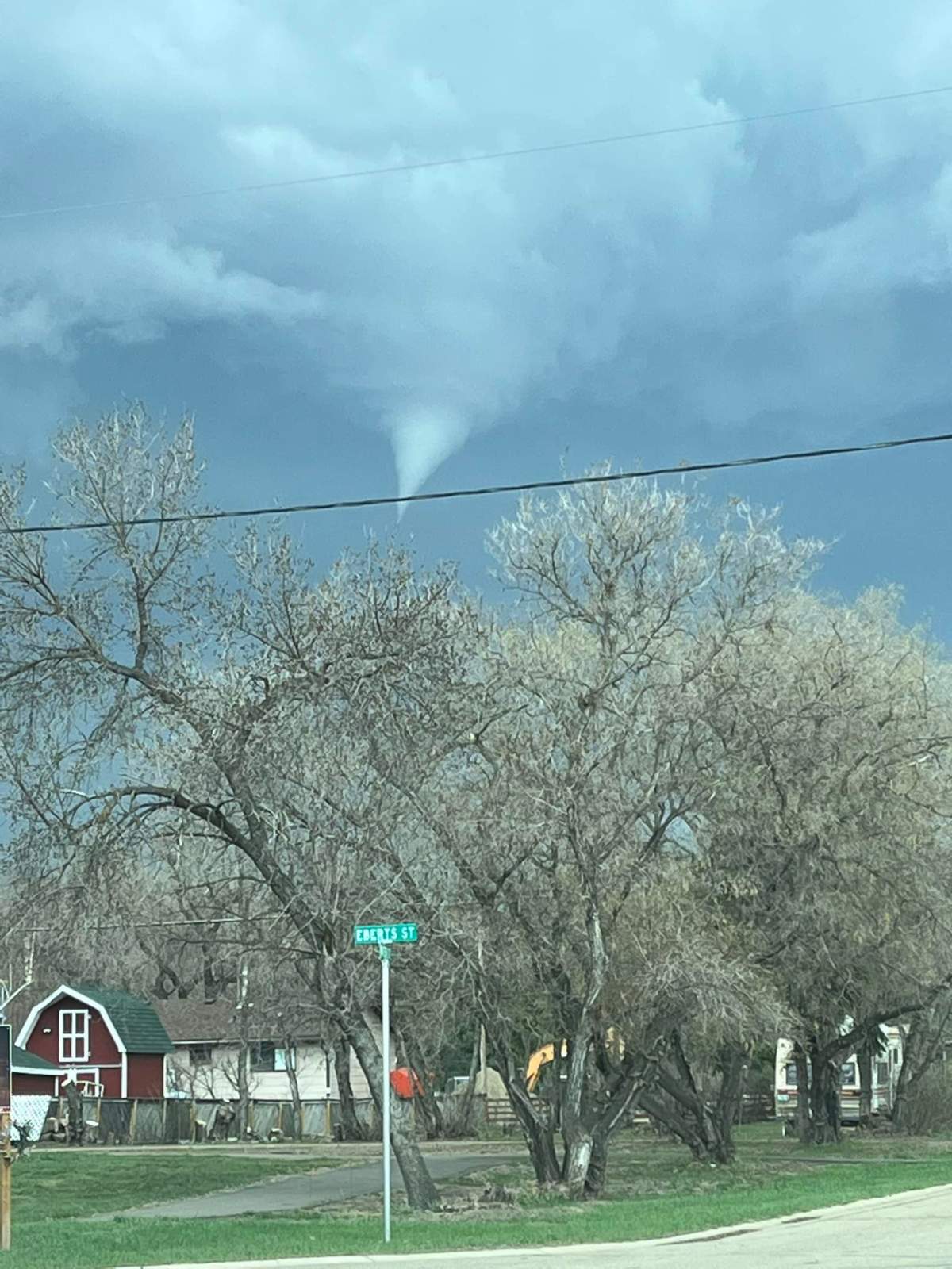 Funnel clouds rising up in the air close to Regina on the weekend