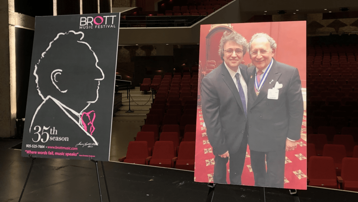 A poster for the 35th season of the Brott Music Festival next to a photo of Alain Trudel and Boris Brott.