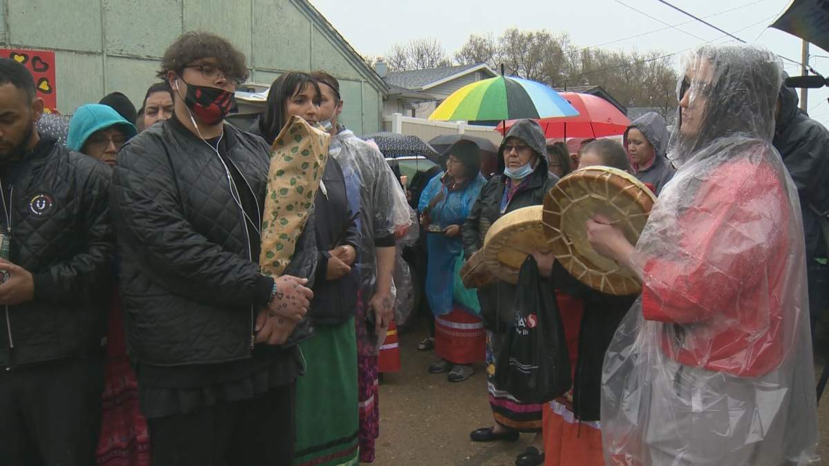 Family, friends hold vigil for 24-year-old homicide victim - image