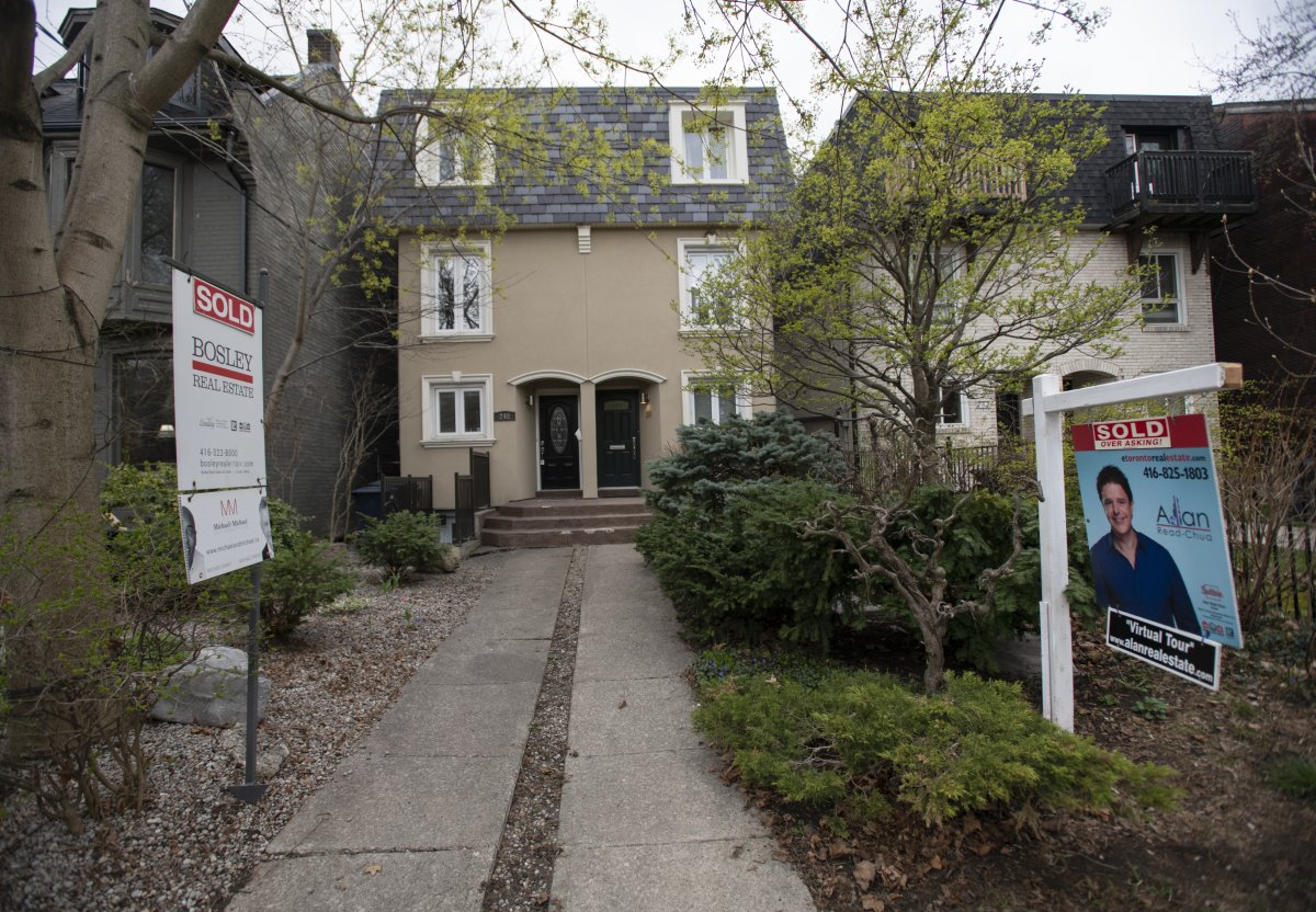 Two semi detached homes at 248 and 250 Seaton St. Toronto, Ont. which have both been sold, are photographed on April 15, 2021. Fred Lum/The Globe and Mail.