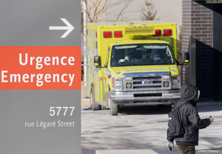 An ambulance is shown outside a hospital in Montreal, Saturday, January 15, 2022. 