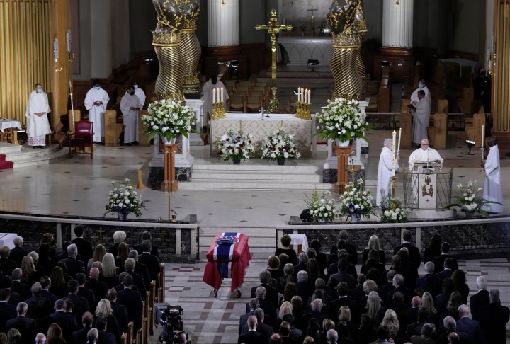 The casket of Guy Lafleur sits at the front of the cathedral during the funeral service in Montreal.
