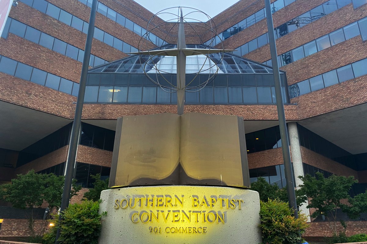 A cross and Bible sculpture stand outside the Southern Baptist Convention headquarters in Nashville, Tenn., on Tuesday, May 24, 2022.