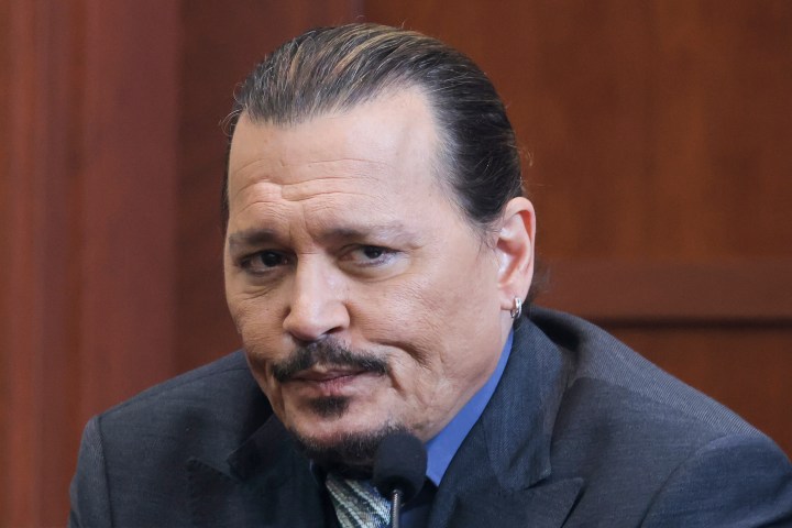 Actor Johnny Depp testifies in the courtroom in the Fairfax County Circuit Courthouse in Fairfax, Va., on Wednesday.