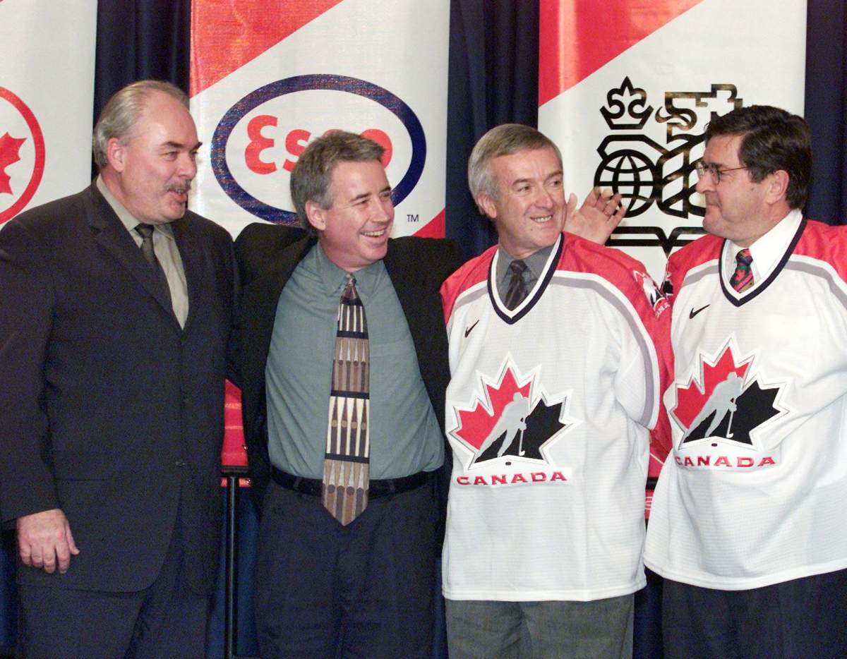 Wayne Russell, chair of the board of the Canadian Hockey Association, Bob Nicholson, president of the Canadian Hockey Association, Denny Deveau, president of Hockey Nova Scotia and Fred MacGillivray, president of Trade Centre Limited, left to right, celebrate Halifax’s winning bid to host the 2003 world junior hockey championship, in Halifax on Tuesday, Dec. 19, 2000. Halifax beat out bids from Ottawa, Saskatoon, Toronto/London and Hamilton/Kitchener.(CP PHOTO/Andrew Vaughan)