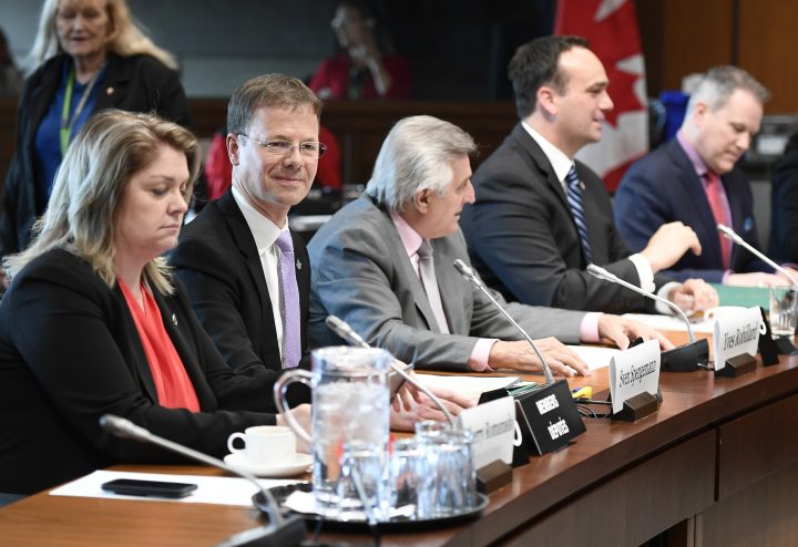 Sven Spengemann (second left) waits for the start of the Standing Committee on National Defence, Sherry on Parliament Hill in Ottawa on Thursday, May 16, 2019.