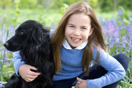 Princess Charlotte poses with her family's new dog, Orla, in photos released ahead of her seventh birthday.