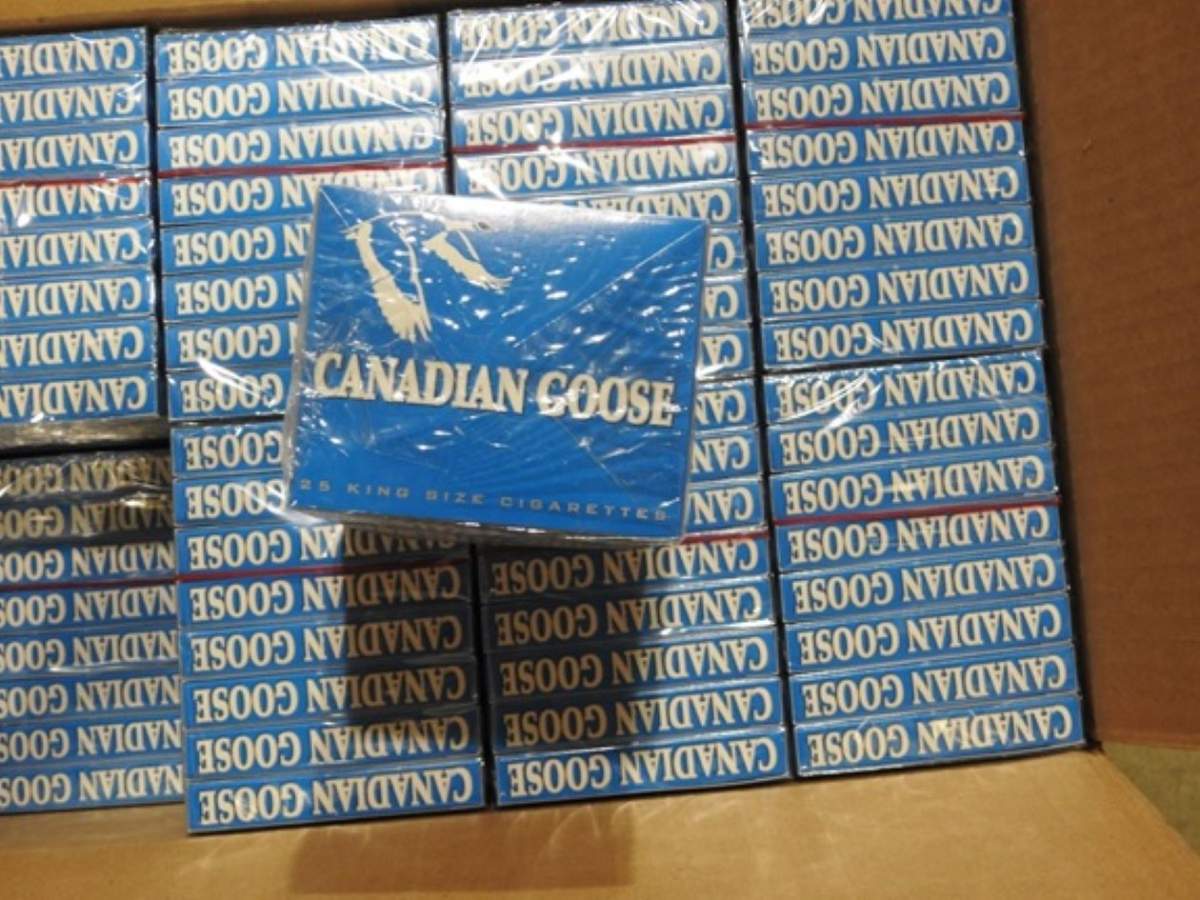 Eight people have been charged after an Edmonton police investigation led officers to seize more than $1.1 million worth of contraband cigarettes, drugs, cash and cars.