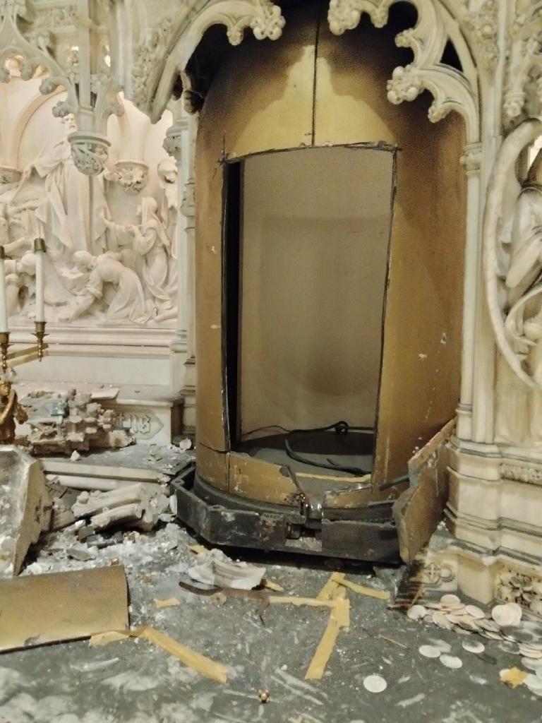 The damage to the alter from when the tabernacle was stolen from St. Augustine Roman Catholic Church in Brooklyn, NY.
