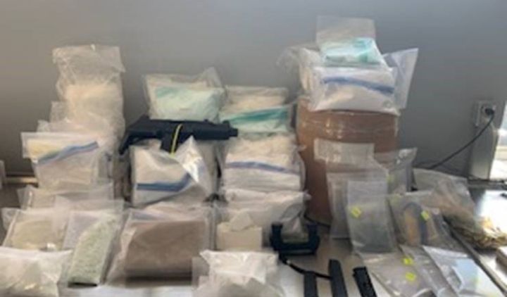 More than half-a-million dollars worth of drugs as well as an "automatic machine gun" were sized when police officers executed a search warrant at a warehouse in north Edmonton last month.
