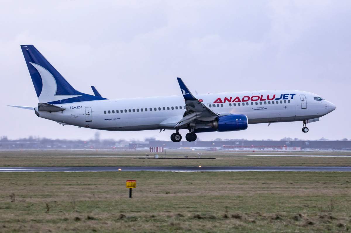AnadoluJet Boeing 737-800 aircraft as seen flying on final approach and landing at Amsterdam Schiphol Airport in this undated photo.  AnadoluJet is a regional airline, a brand of Turkish Airlines .
