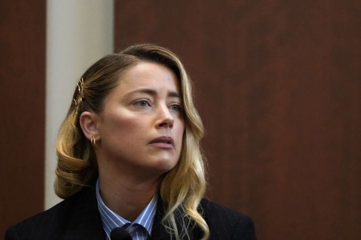 Actor Amber Heard testifies at Fairfax County Circuit Court during a defamation case against her by ex-husband, actor Johnny Depp, in Fairfax, Virginia, on May 4, 2022.