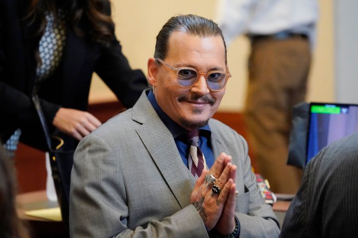 Actor Johnny Depp arrives in the courtroom at the Fairfax County Circuit Courthouse in Fairfax, Va., on May 16, 2022.