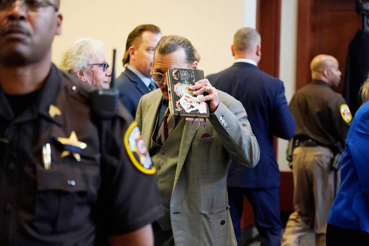 Johnny Depp looks toward the courtroom gallery as they take a break at the Fairfax County Circuit Courthouse in Fairfax, Virginia, on May 16, 2022.
