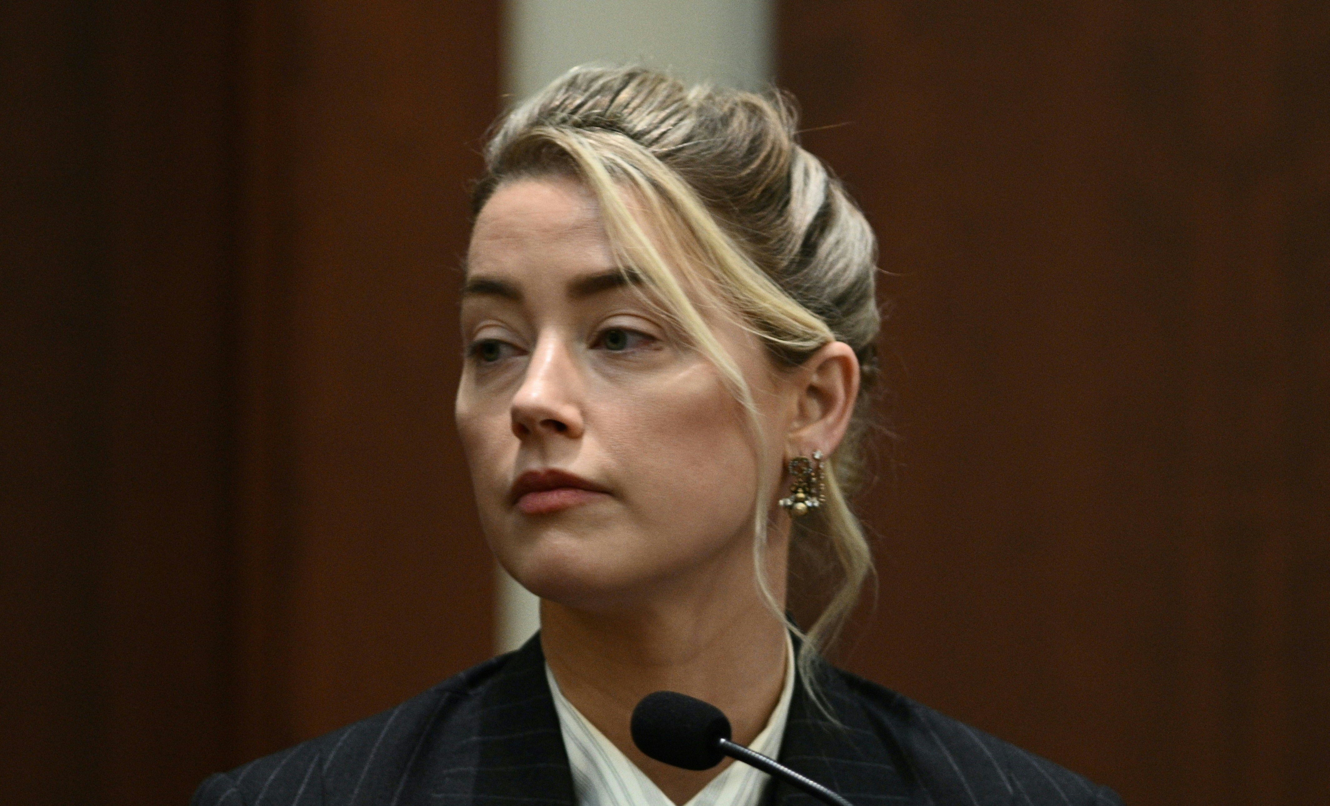 Amber Heard leaves stand after tense cross-exam by Johnny Depp’s lawyers