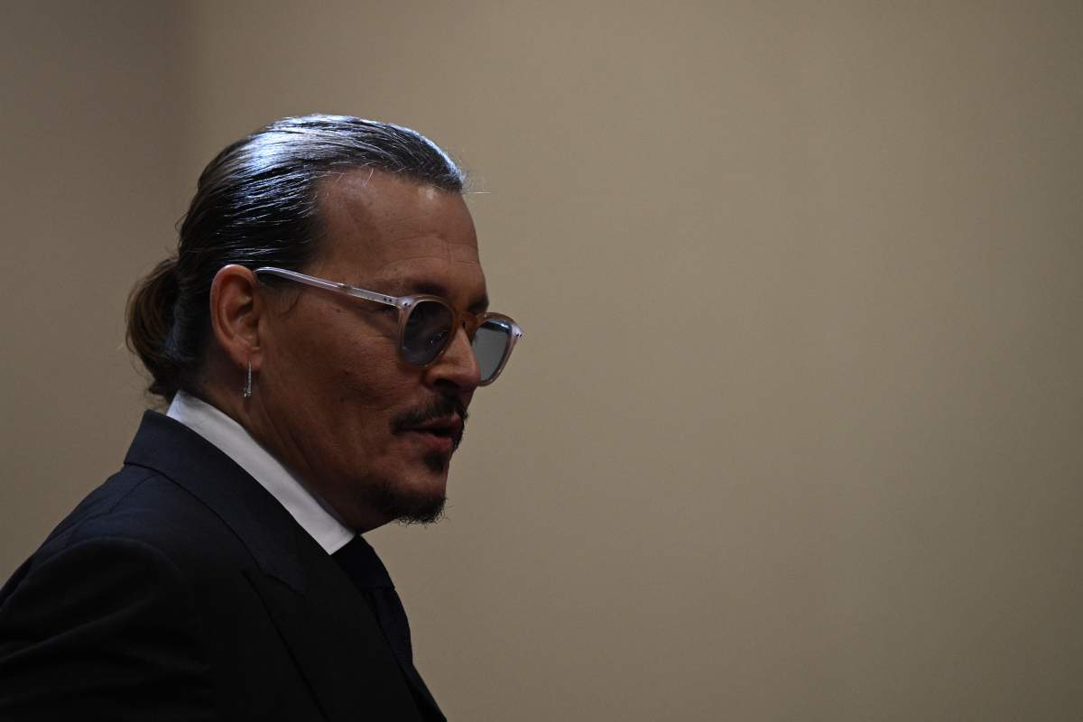 US actor Johnny Depp returns to the courtroom after a break at the Fairfax County Circuit Courthouse in Fairfax, Virginia, May 17, 2022.