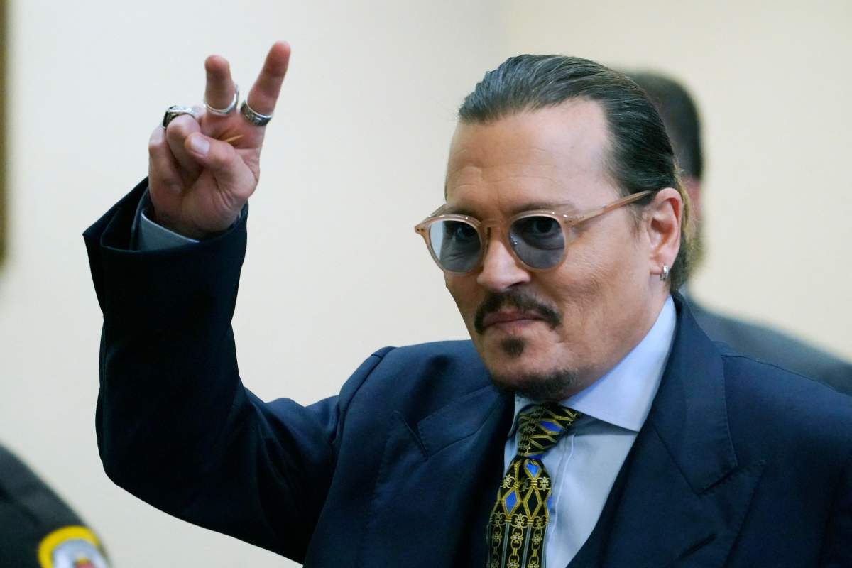 US actor Johnny Depp arrives into the courtroom after a lunch break at the Fairfax County Circuit Courthouse in Fairfax, Virginia, on May 23, 2022.
