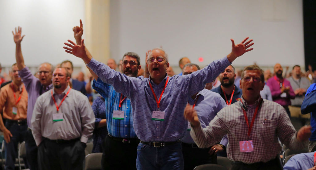 Messengers worship God, singing after a sermon by the Rev. Steve Gaines, the current president, on Tuesday, June 12, 2018 at the 2018 annual meeting of the Southern Baptist Convention in Dallas, Texas.