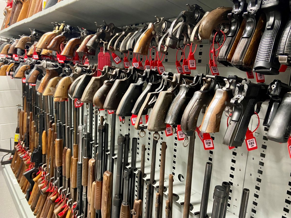 A row of guns stored at the Calgary Police Services' Forensic Firearm and Toolmark Lab.