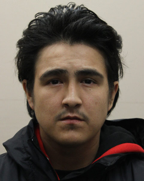 Deschambault Lake RCMP are searching for a 21-year-old man who escaped from their custody when he was being escorted to a parked police vehicle after court.