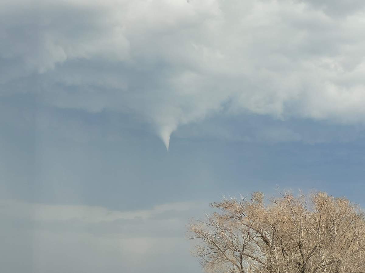 Funnel cloud hovering over the ground near Regina on the weekend
