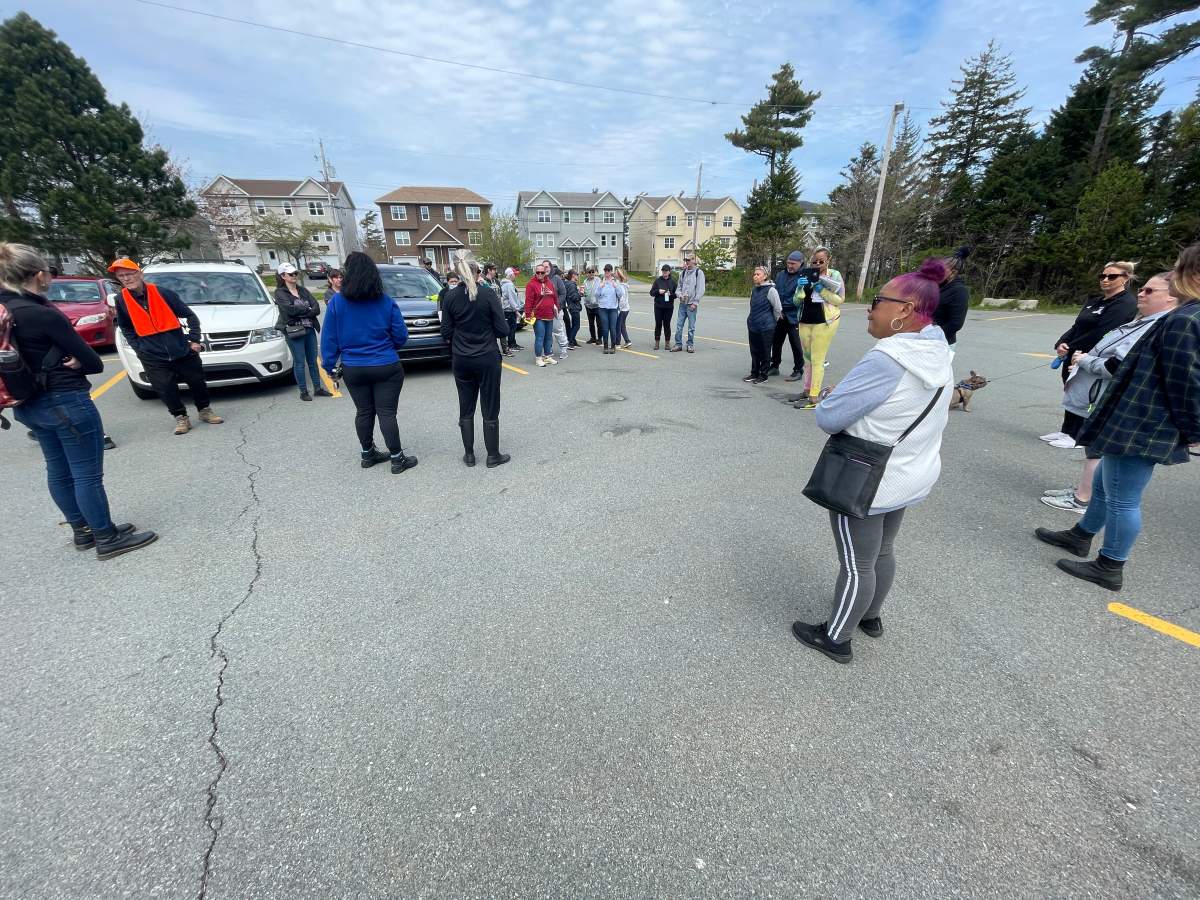 Family, friends and community members search for Devon Sinclair Marsman in Spryfield on May 21, 2022.