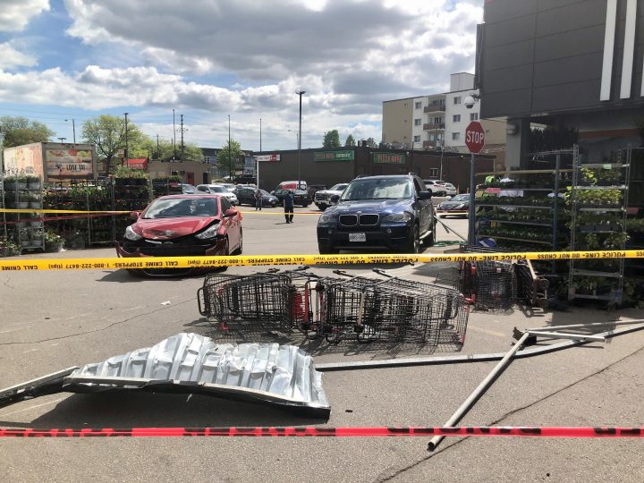 The scene at a grocery store parking lot following the collision.
