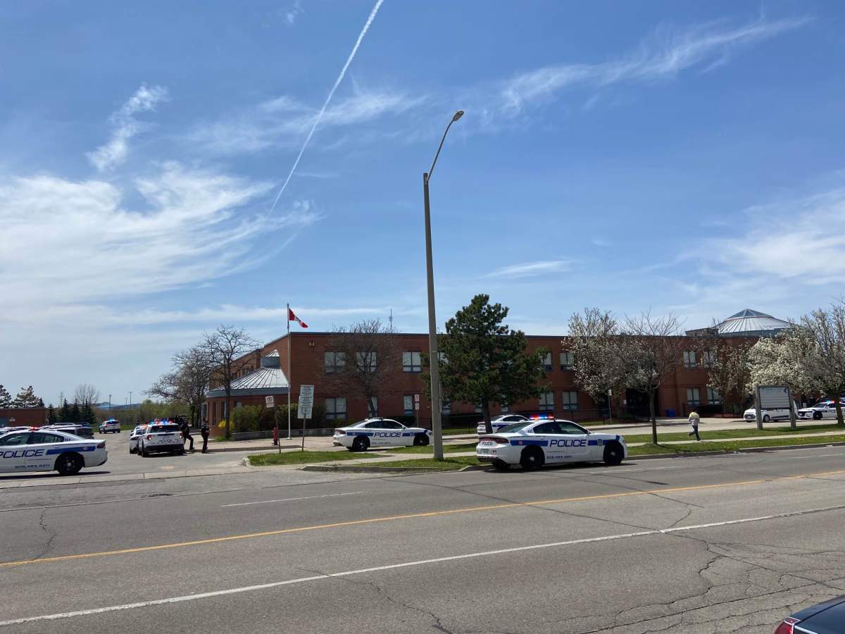 In an update just after 1 p.m., officers said the youth believed to be involved was not located during a search inside the school.