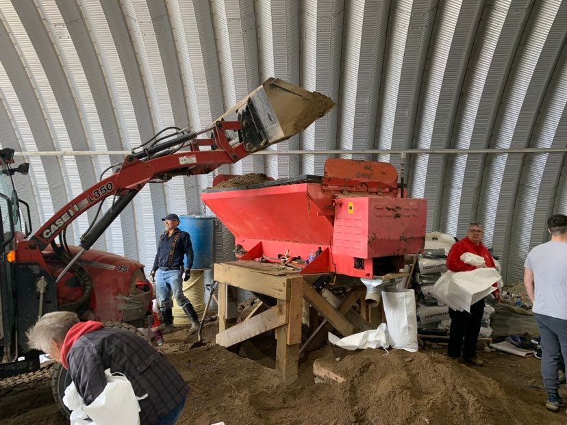Sandbags are made in Minnedosa Tuesday.