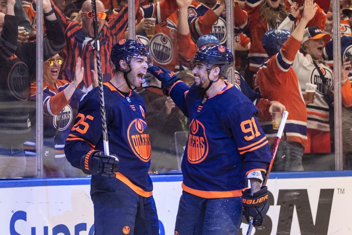Edmonton Oilers’ Darnell Nurse (25) and Evander Kane (91) celebrate a goal against the Los Angeles Kings during second period NHL playoff action in Edmonton on Wednesday, May 4, 2022.
