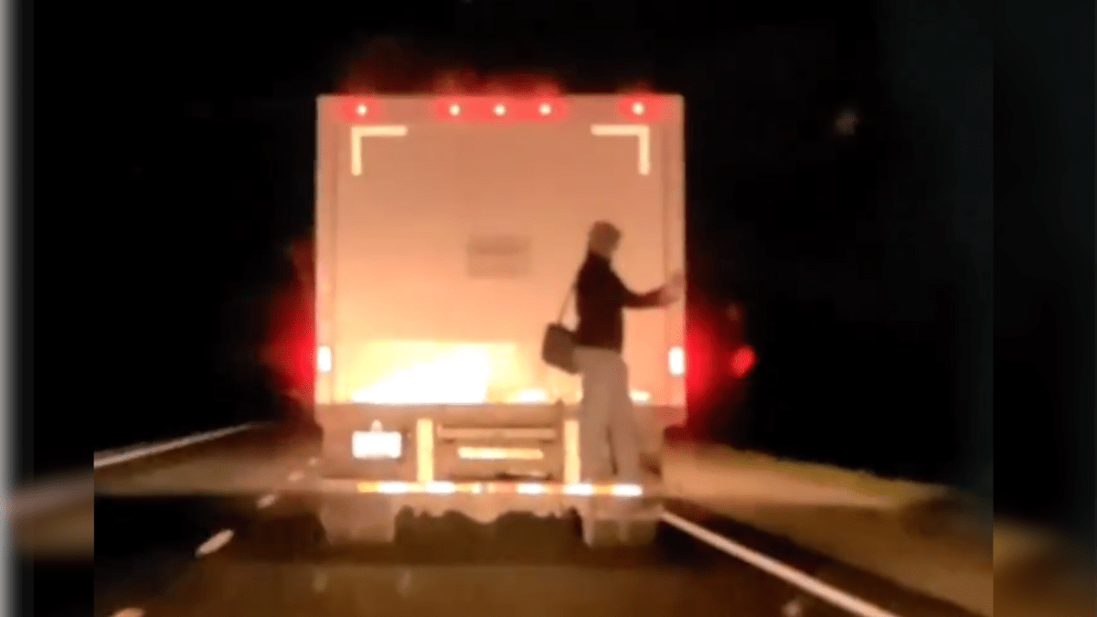 OPP in Norfolk charged an individual caught on video hitching a dangerous ride on the back of cargo truck on Highway 24.
