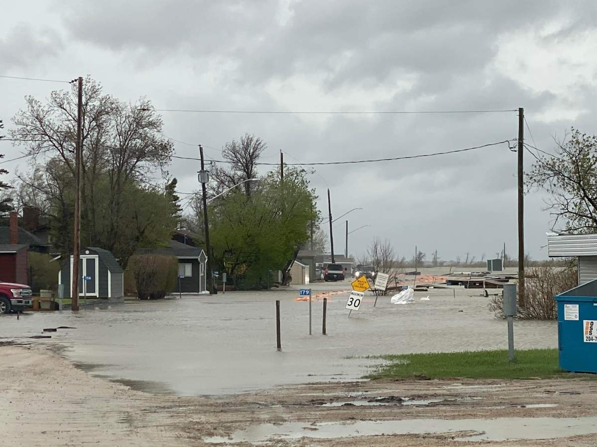Mandatory evacuations ordered at Dauphin Lake communities over flooding - image
