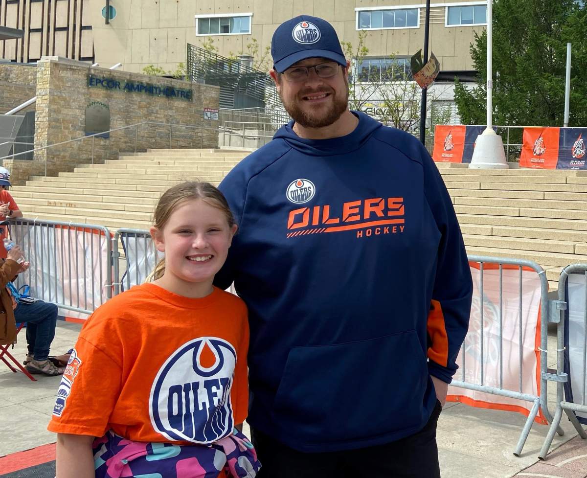 Calia Maclachlan, and her dad Jerry, at the “Let’s Go Oilers! Community Rally” in Churchill Square in advance of Game 4 on Tuesday, May 24, 2022.