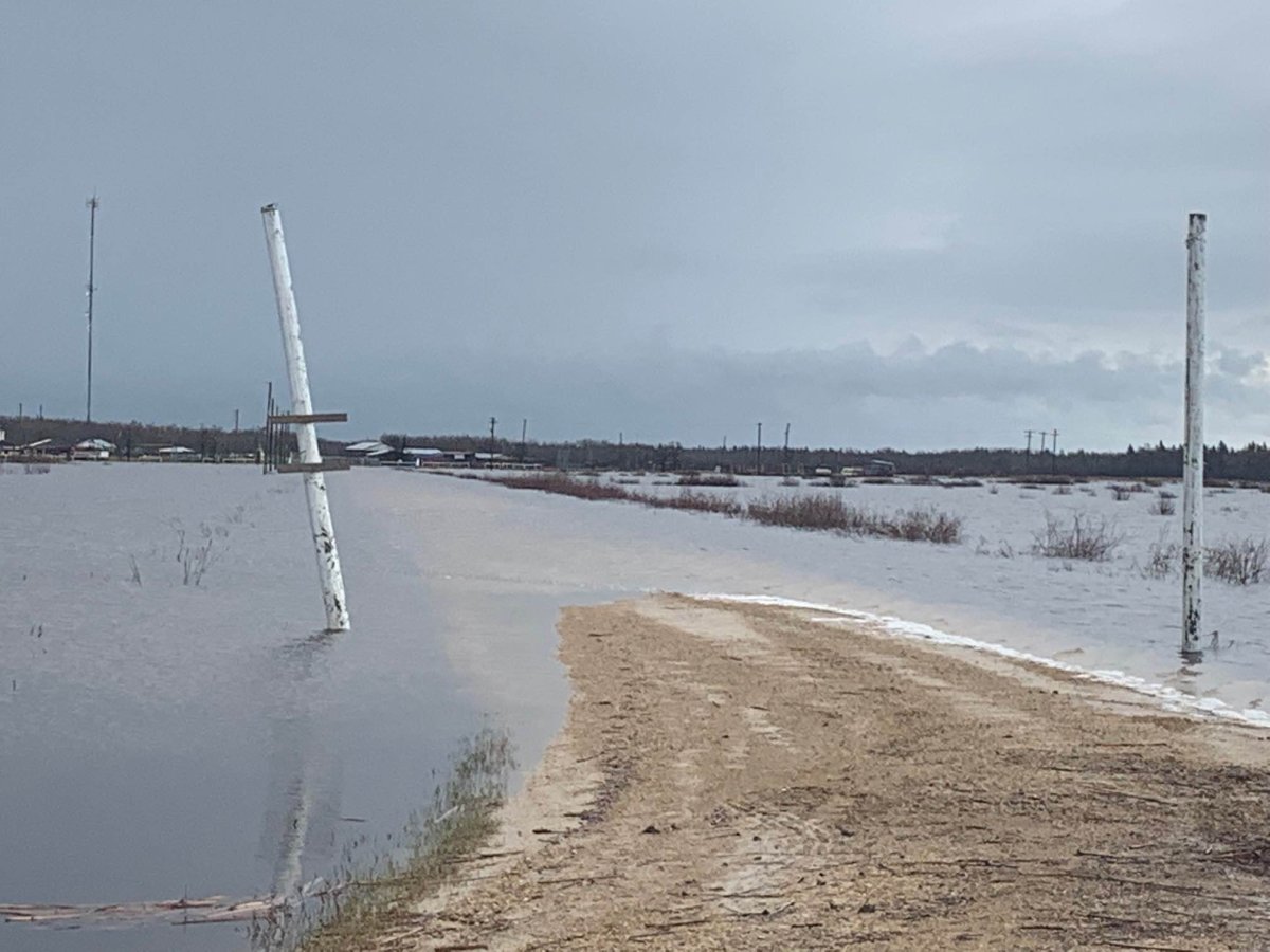 A road is washed out due to flooding around Peguis First Nation in Manitoba. Environment Canada says more rain is likely on the way for much of southern Manitoba.