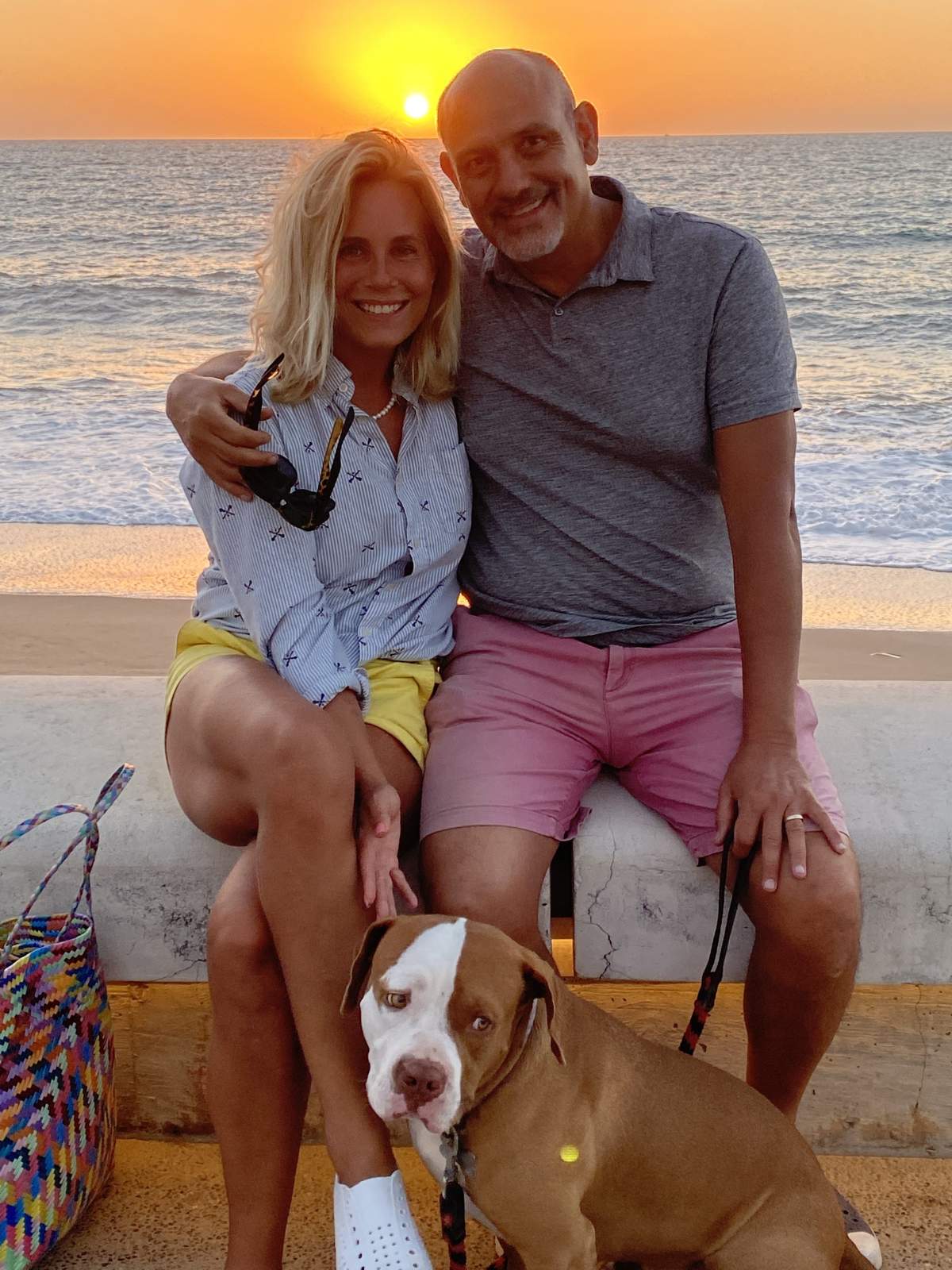 Kimberley and Manuel in Puerto Vallarta with their dog, Rígo.