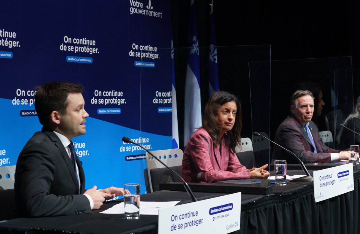 Parti Québécois leader Paul St-Pierre Plamondon addresses a news conference next to Liberal leader Dominique Anglade and Quebec Premier François Legault  on Tuesday, December 22, 2020.