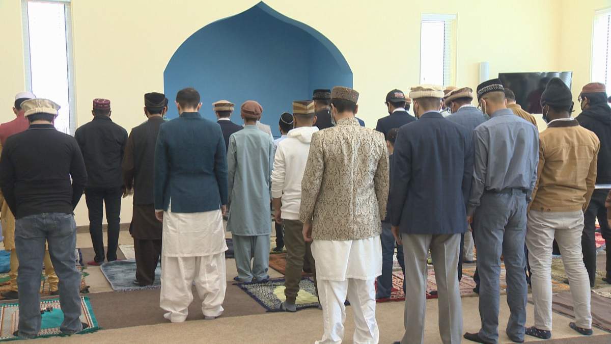 Muslim followers get ready for Eid prayers at a mosque in eastern Regina