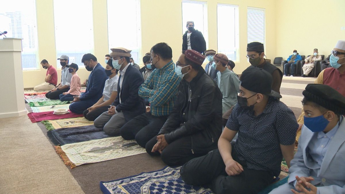 Muslim followers get ready for Eid prayers at a mosque in eastern Regina.