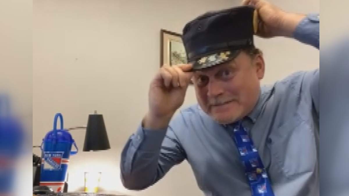 Chad R. MacDonald dons his old conductor hat from his job as Clyde, the conductor of the Evangeline, at Upper Clements Park in Nova Scotia